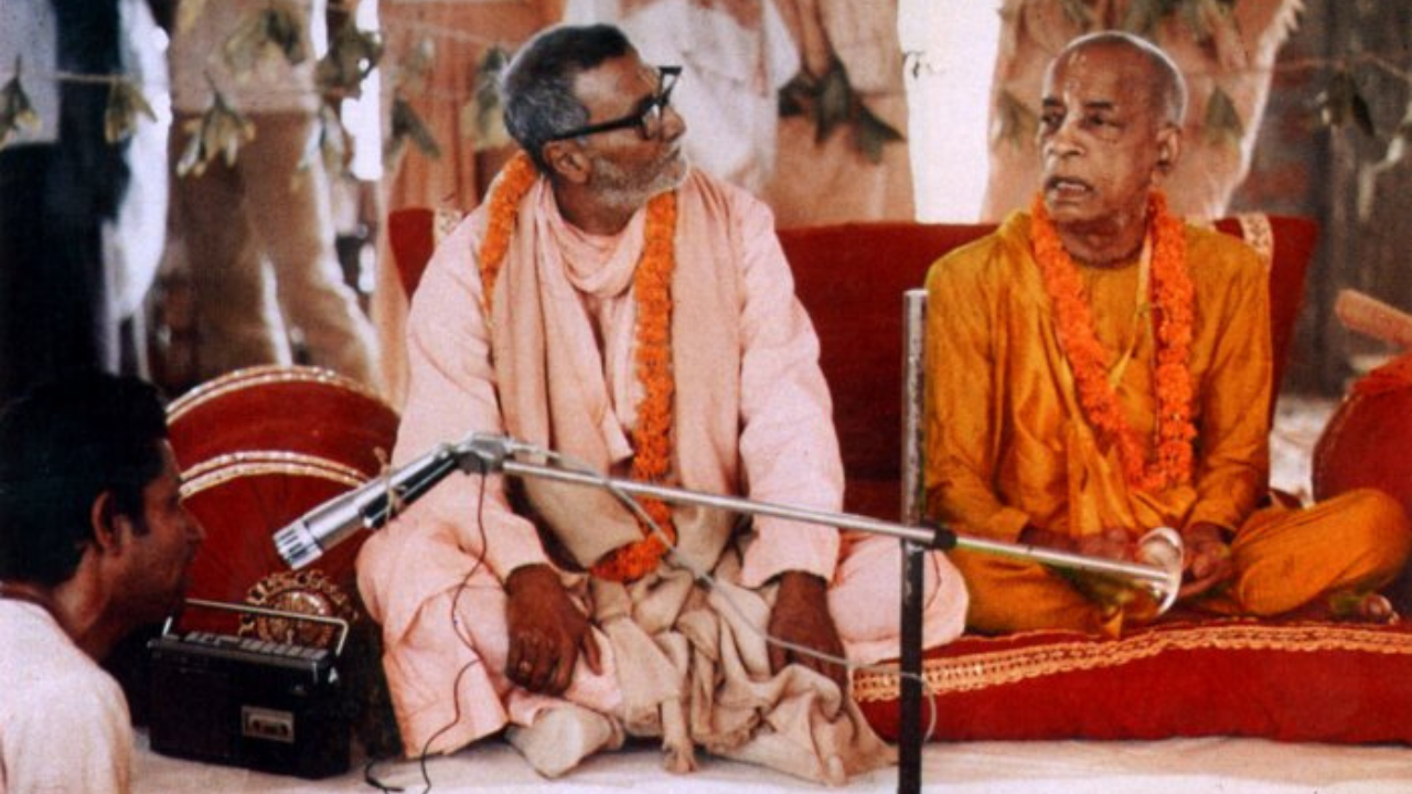 Bhaktivedanta Swami Prabhupada seated beside Bhakti Rakshak Sridhara Maharaj